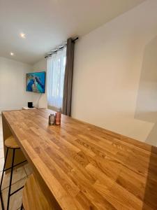 Maisons de vacances Maison de ville renovee a 15 min de Lyon : photos des chambres