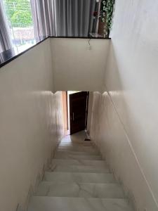 Quarto com banheiro privado em casa de família 15km de Belém