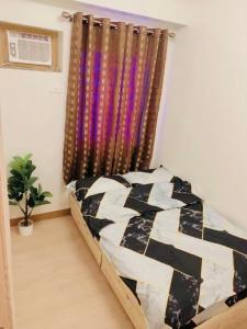 2 BR condo trees residences Netflix Games karaoke