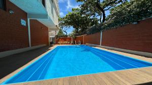 Casa com piscina e churrasqueria privativa na praia do Pepê a apenas 80 metros do mar