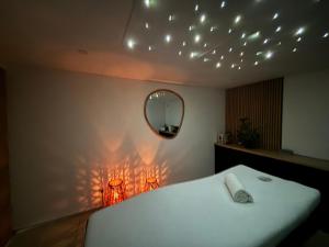 Maisons de vacances Appartement avec jacuzzi : photos des chambres