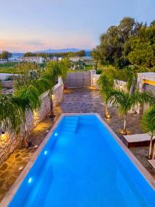 Odyssea Seaside Apartment with Sea View and Pool