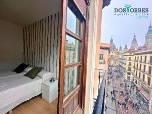 Dos Torres Pilar Suites- balcones con vistas a la ciudad