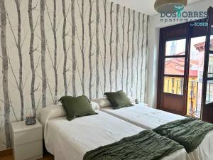 Dos Torres Pilar Suites- balcones con vistas a la ciudad