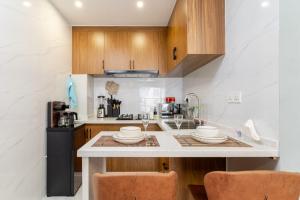 Alba with pool, gym, mini market, and free parking