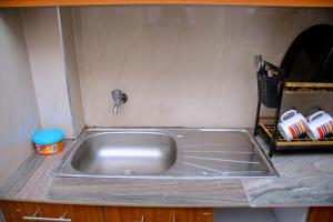 Golden Glow Suites - Thindigua