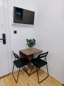 Tiny studio in top center