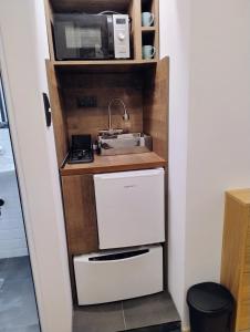 Tiny studio in top center