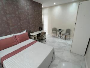 Quarto com banheiro privado em casa de família 15km de Belém