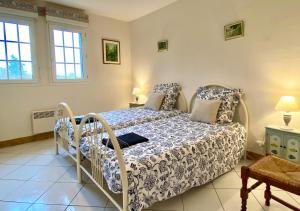 Villas Villa Champfleury, a 50 m de la plage! : photos des chambres