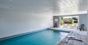 Villas Villa d-architecte piscine interieure 12 personnes : Villa