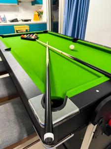 2BR Luxury Penthouse Christmas Stay with Wide Balcony and 7ft Billiards The Polaris Penthouse at Azure North