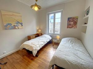 Maisons de vacances Maison familiale renovee a 150m des criques, 4 chambres, jardin prive, cheminee, parking, WiFi - FR-1-349-222 : photos des chambres