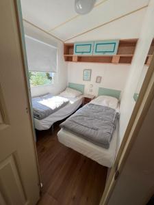 Campings La Pinede Ensoleillee au Camping La Dune Blanche : photos des chambres