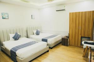 Khách Sạn The One Hotel 1
