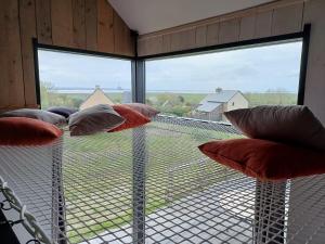 Maisons de vacances Au bon coin de la baie : photos des chambres