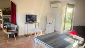 Maisons de vacances La maison aux volets bleus : photos des chambres