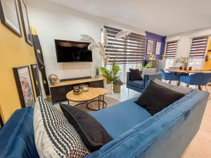 Appartements Cocon familial avec jardin 2 adultes & 1 enfant : photos des chambres