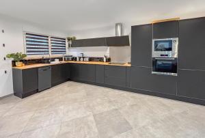 Appartements Cocon familial avec jardin 2 adultes & 1 enfant : photos des chambres