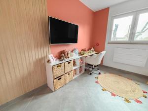 Appartements Cocon familial avec jardin 2 adultes & 1 enfant : photos des chambres