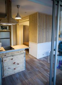 Appartements Appartement T1bis avec jardinet au calme : photos des chambres