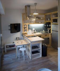 Appartements Appartement T1bis avec jardinet au calme : photos des chambres