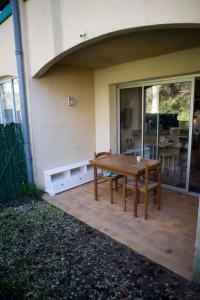 Appartements Appartement T1bis avec jardinet au calme : photos des chambres