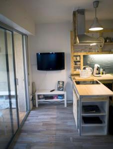Appartements Appartement T1bis avec jardinet au calme : photos des chambres