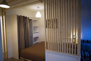 Appartements Appartement T1bis avec jardinet au calme : photos des chambres