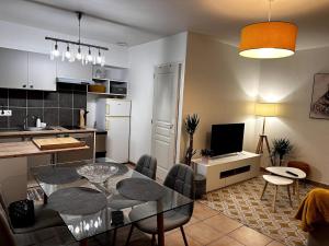 Appartements Cozy atmosphere 4pers near Eurexpo GroupamaStadium : photos des chambres