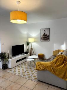 Appartements Cozy atmosphere 4pers near Eurexpo GroupamaStadium : photos des chambres