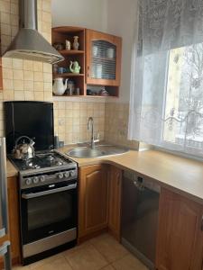 Apartament przy Parku Czartoryskich II - Faktury VAT - parking