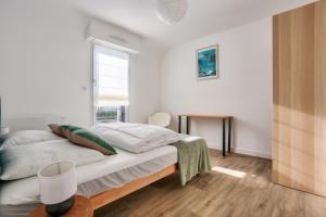Maisons de vacances Maison lumineuse pour 8 avec grand jardin : photos des chambres