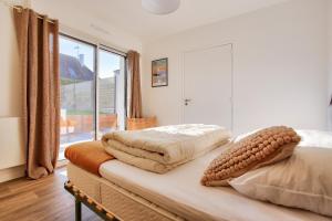 Maisons de vacances Maison lumineuse pour 8 avec grand jardin : photos des chambres