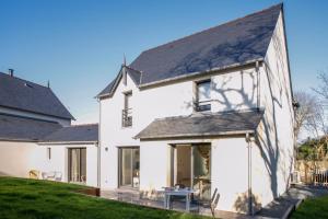 Maisons de vacances Maison lumineuse pour 8 avec grand jardin : photos des chambres