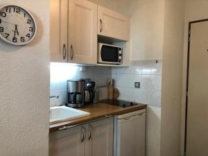 Appartements Studio cosy en centre-ville, a proximite des thermes et des pistes du domaine des Trois Vallees - FR-1-512-228 : photos des chambres