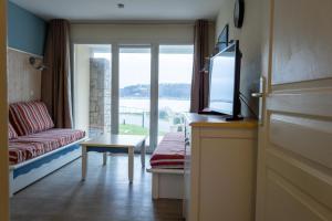 Appartements Ti Cap - plage a pieds - Piscine : photos des chambres