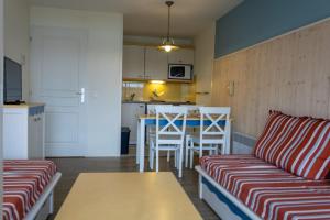 Appartements Ti Cap - plage a pieds - Piscine : photos des chambres