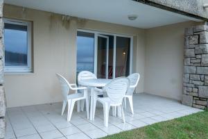 Appartements Ti Cap - plage a pieds - Piscine : photos des chambres