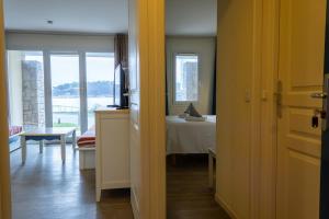 Appartements Ti Cap - plage a pieds - Piscine : photos des chambres