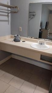 Gated King Bed Hotel Room 216