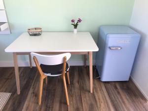 Light tiny house in green area with sauna option