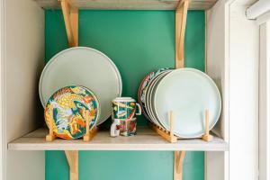 Light tiny house in green area with sauna option