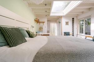 Light tiny house in green area with sauna option