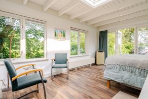 Light tiny house in green area with sauna option