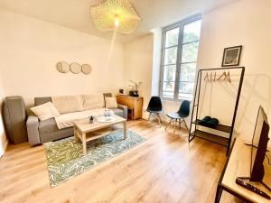 Appartements Le Romarin Wifi Cosy : photos des chambres