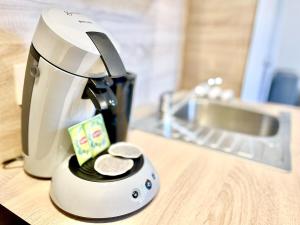 Appartements Le Romarin Wifi Cosy : photos des chambres