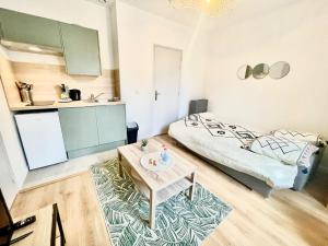Appartements Le Romarin Wifi Cosy : photos des chambres