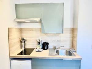 Appartements Le Romarin Wifi Cosy : photos des chambres