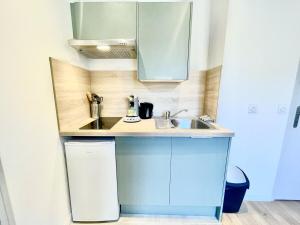 Appartements Le Romarin Wifi Cosy : photos des chambres